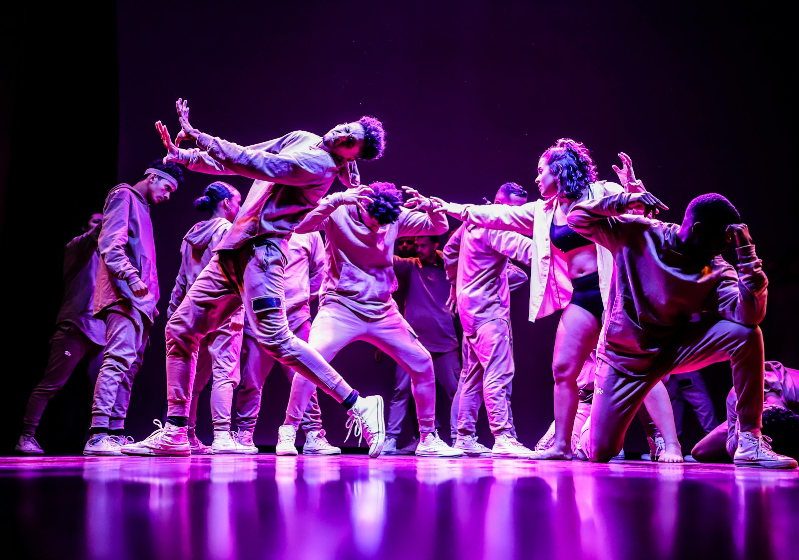 group of men in green and white shirts dancing on stage, k-pop dance, t-pop dance